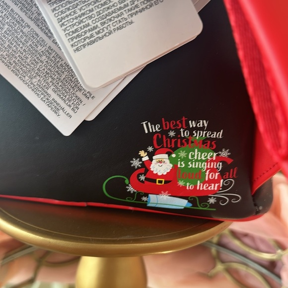 🧝SMILING’S MY FAVORITE ELF LOUNGFLY🧝 - Picture 4 of 6